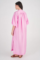 Profile view of model wearing the Oroton Column Shirt Dress in Bright Foxglove and 100% Silk for Women