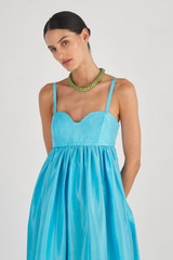 Profile view of model wearing the Oroton Bodice Detail Gown in Lake and 100% Silk for Women