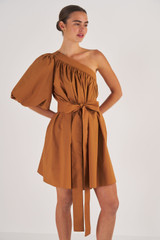 Profile view of model wearing the Oroton One Shoulder Gathered Dress in Brandy and 100% Cotton for Women