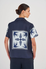 Profile view of model wearing the Oroton Scarf Print Camp Shirt in North Sea and 100% Silk for Women
