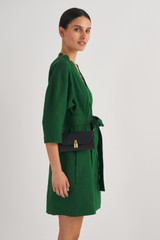 Profile view of model wearing the Oroton Tate Crossbody in Black and Pebble Leather for Women