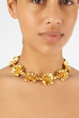 Profile view of model wearing the Oroton Peony Necklace in Worn Gold and Brass for Women . IP:2