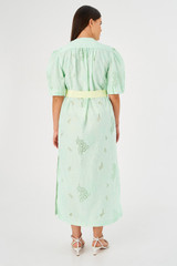 Profile view of model wearing the Oroton Lace Column Dress in Sea Spray and 100% polyester for Women