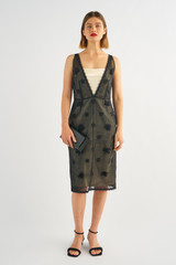 Profile view of model wearing the Oroton Mini 3D Flower Overlay Shift Dress in Black/Cream and Underlay: 80% acetate, 20% polyester/overlay:100% cotton for Women