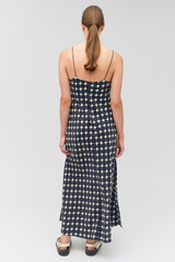 Profile view of model wearing the Oroton Penny Flower Slip Dress in North Sea and 100% silk for Women