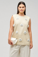 Profile view of model wearing the Oroton Flower Sequin Tunic in Limestone and 100% linen for Women