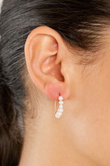 Profile view of model wearing the  Kimberley Pearl Thread Earrings in Gold/Pearl and Brass for Women . IP:3