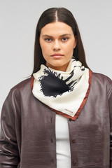 Profile view of model wearing the Oroton Graphic Floral Scarf in Cream and 100% silk for Women . IP:3