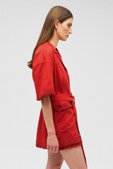 Profile view of model wearing the Oroton Fringe Detail Dress in Poppy and 100% cotton for Women . IP:4