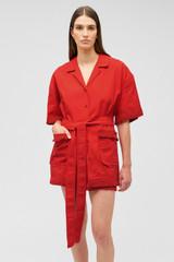 Profile view of model wearing the Oroton Fringe Detail Dress in Poppy and 100% cotton for Women .