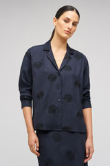Profile view of model wearing the Oroton Embroidered Starburst Shirt in North Sea and 48% VISCOSE 26% TENCEL 26% LINEN for Women