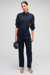 Profile view of model wearing the Oroton Pinstripe Overshirt in North Sea and 95% WOOL 5% ELASTANE for Women . IP:2
