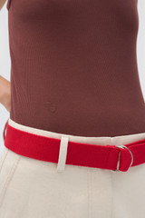 Profile view of model wearing the Oroton Lottie Rib Tank in Chocolate and 92% Cotton / 8% Spandex for Women .