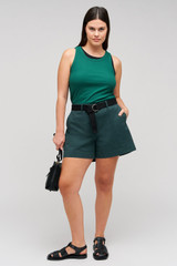 Profile view of model wearing the Oroton Lottie Rib Tank in Villa Green and 92% Cotton / 8% Spandex for Women