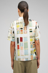 Profile view of model wearing the Oroton Vintage Ribbon Camp Shirt in Multi and 100% Silk for Women . IP:5