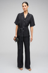 Profile view of model wearing the Oroton Spot Print Pj Pant in Black/Cream and 100% Silk for Women . IP:2