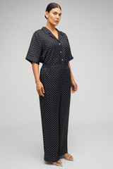 Profile view of model wearing the Oroton Spot Print Pj Pant in Black/Cream and 100% Silk for Women . IP:10