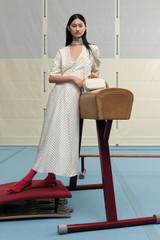 Profile view of model wearing the Oroton Spot Print Day Dress in Cream and 100% Silk for Women . IP:6