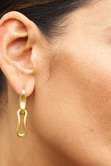 Profile view of model wearing the Oroton Livia Drop Earring in Worn Gold and  for Women . IP:2