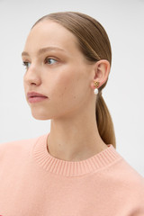 Profile view of model wearing the Oroton Leah Pearl Drop Earrings in Gold and Brass for Women . IP:2