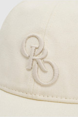 Detail product shot of the Oroton Oro Logo Cap in Antique White and High-quality 100% cotton material for Women . IP:21