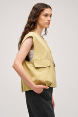 Profile view of model wearing the Oroton Cotton Twill Vest in Wheat and  for Women . IP:4