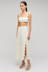 Profile view of model wearing the Oroton Rosebud Lace Skirt in Soft Cream and 100% linen material for Women . IP:4