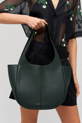 Profile view of model wearing the Oroton Emilia Tote in Vine and Premium pebble leather for Women . IP:4