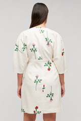 Profile view of model wearing the Oroton Rosebud Short Dress in Antique White and 100% linen material for Women . IP:11