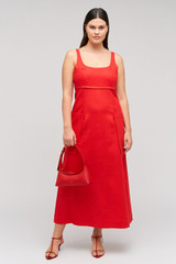 Profile view of model wearing the Oroton Structured Sundress in Poppy and 100% linen material for Women . IP:8