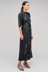 Profile view of model wearing the Oroton Rosebud Tie Neck Dress in Black and 100% Silk for Women . IP:4