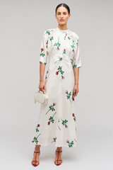 Profile view of model wearing the Oroton Rosebud Tie Neck Dress in Antique White and 100% Silk for Women . IP:2