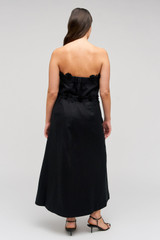 Profile view of model wearing the Oroton Rosebud Lace Skirt in Black and 100% linen material for Women . IP:11