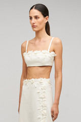 Profile view of model wearing the Oroton Rosebud Lace Bralet in Soft Cream and 100% linen material for Women . IP:4