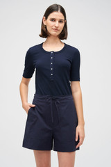 Profile view of model wearing the Oroton Teddy Poplin Boxer in North Sea and 100% Cotton for Women