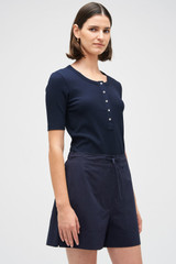 Profile view of model wearing the Oroton Teddy Poplin Boxer in North Sea and 100% Cotton for Women