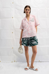 Profile view of model wearing the Oroton Garden Toile Print Short in Ivy and 100% silk for Women . IP:2