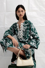 Profile view of model wearing the Oroton Garden Toile Embellished Long Dress in Ivy and 100% silk for Women . IP:2