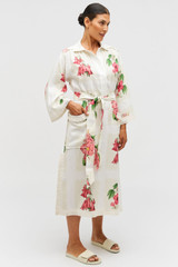 Profile view of model wearing the Oroton Verandah Floral Long Tunic Dress in Multi and 100% Linen for Women