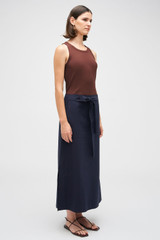 Profile view of model wearing the Oroton Clover Poplin Skirt in North Sea and 100% Cotton for Women