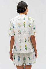 Profile view of model wearing the Oroton Greenhouse Floral Camp Shirt in Mist and 100% Linen for Women . IP:5