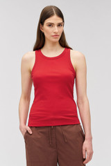 Profile view of model wearing the Oroton Lottie Rib Tank in Market Red and 92% Cotton / 8% Spandex for Women