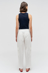 Profile view of model wearing the Oroton Scout Poplin Cargo Pant in White and 100% Cotton for Women