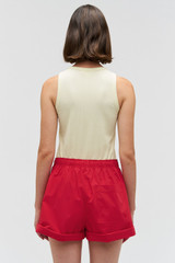 Profile view of model wearing the Oroton Teddy Poplin Boxer in Market Red and 100% Cotton for Women