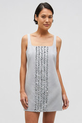 Profile view of model wearing the Oroton Mini Sequin Flower Shift Dress in Oyster and 100% linen for Women . IP:3