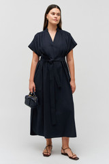 Profile view of model wearing the Oroton Rae Gathered Dress in North Sea and 100% cotton for Women . IP:8