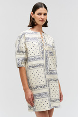 Profile view of model wearing the Oroton Bandana Lace Up Dress in Ecru and 100% cotton twill for Women . IP:4