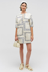 Profile view of model wearing the Oroton Bandana Lace Up Dress in Ecru and 100% cotton twill for Women . IP:2