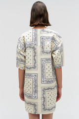 Profile view of model wearing the Oroton Bandana Lace Up Dress in Ecru and 100% cotton twill for Women . IP:5