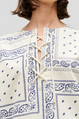 Profile view of model wearing the Oroton Bandana Lace Up Dress in Ecru and 100% cotton twill for Women . IP:6